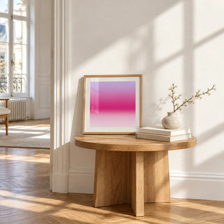 Magenta Print, a small square framed print leaning on a small solid oak side table