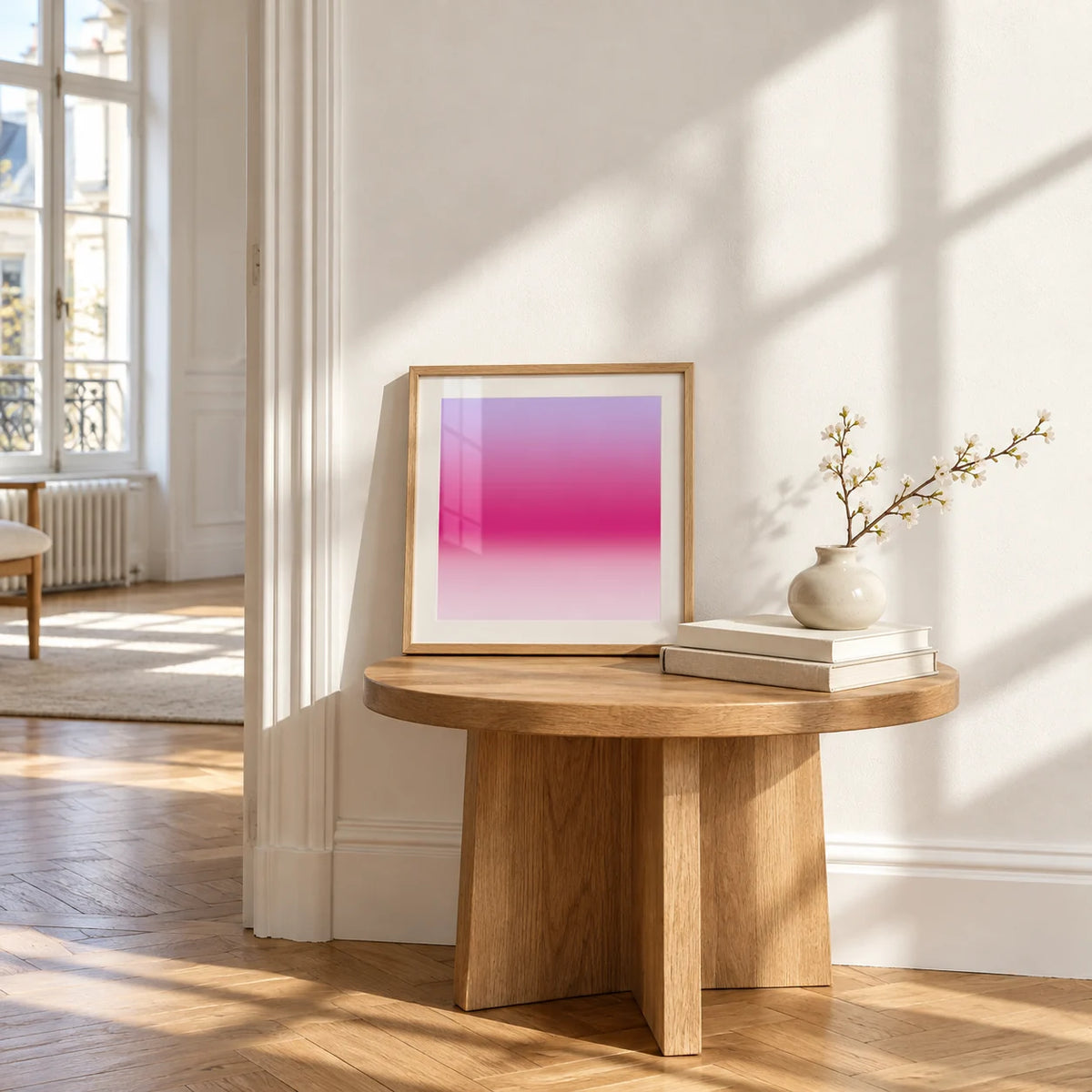 Magenta Print, a small square framed print leaning on a small solid oak side table