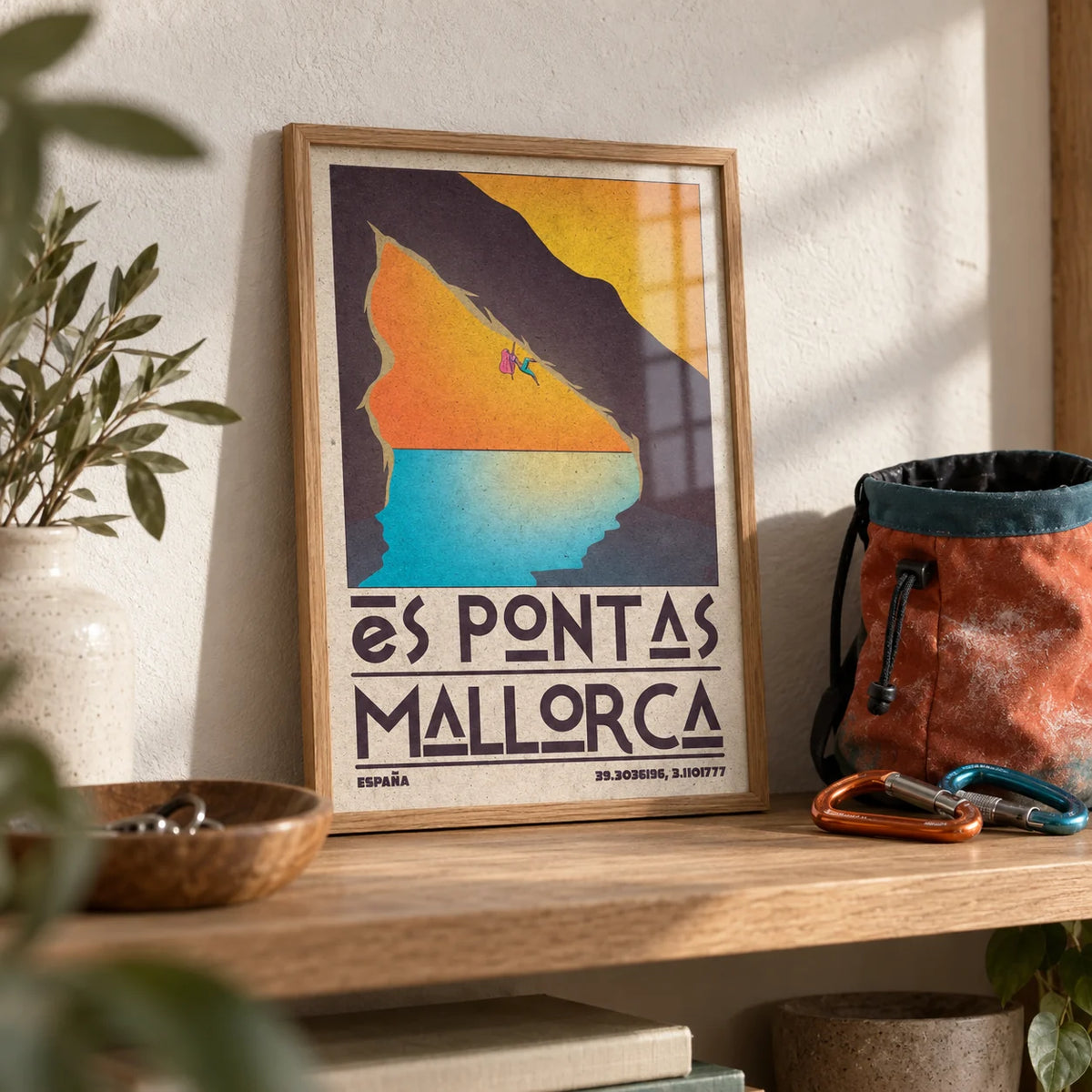 Mallorca Climbing Poster, a small A4 framed print leaning on an oak shelf in a living room