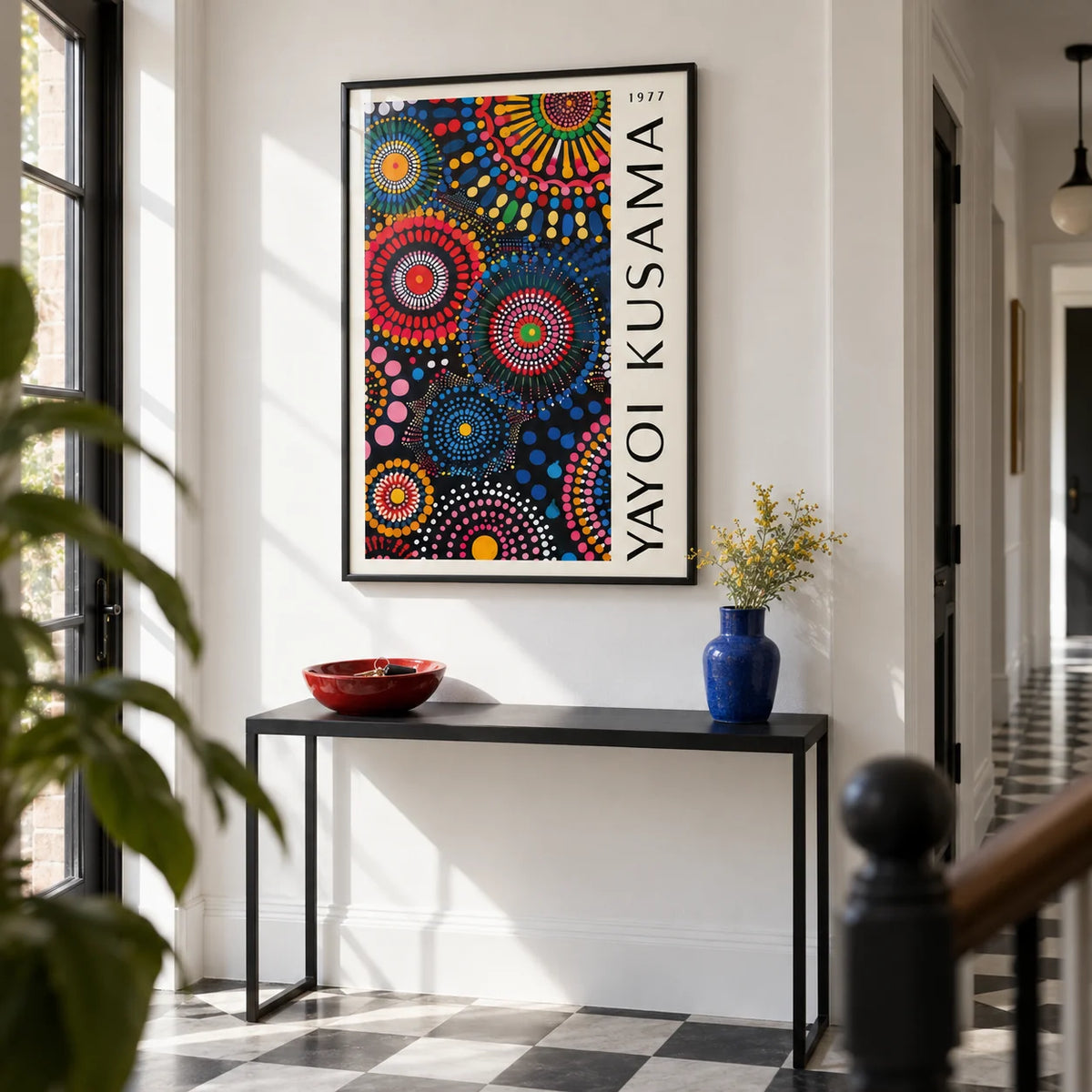 Mandala Art for Wall, framed on the wall of a crisp white hallway with a plain black and white floor