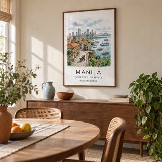 Manila City Art Print, framed on the wall of a relaxed dining room in a UK family home with pale warm plaster walls and an oval wooden table with cane-backed chairs