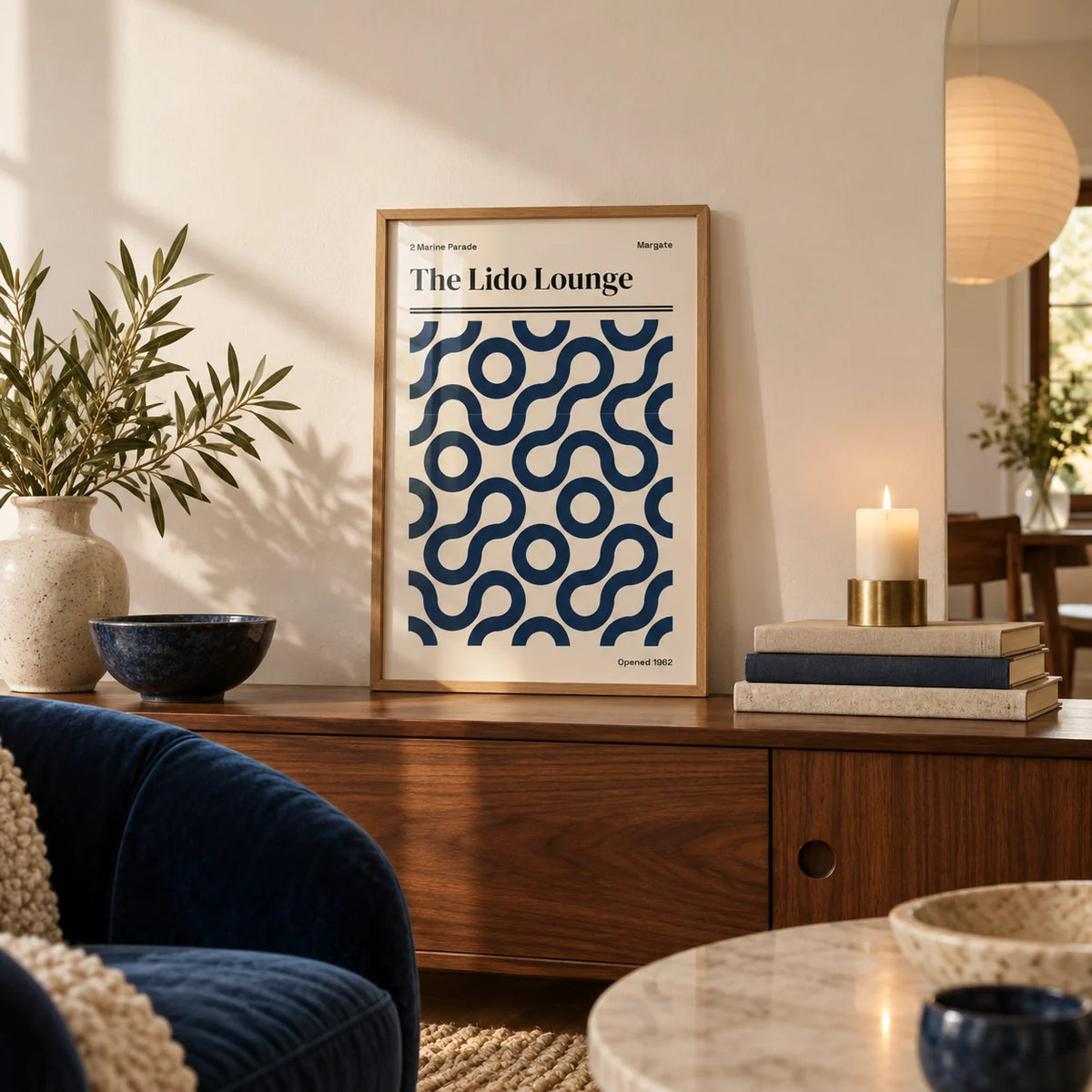 Margate Print, a small A4 framed print leaning on a walnut side table