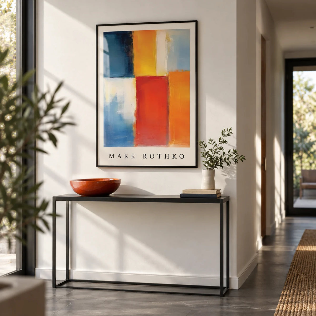 Mark Rothko Orange Red and Yellow, framed on the wall of a modern hallway with a white wall and a dark grey floor