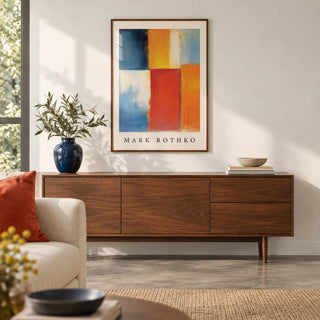Mark Rothko Orange Red and Yellow, framed on the wall of a modern living room with a white wall and a polished concrete floor