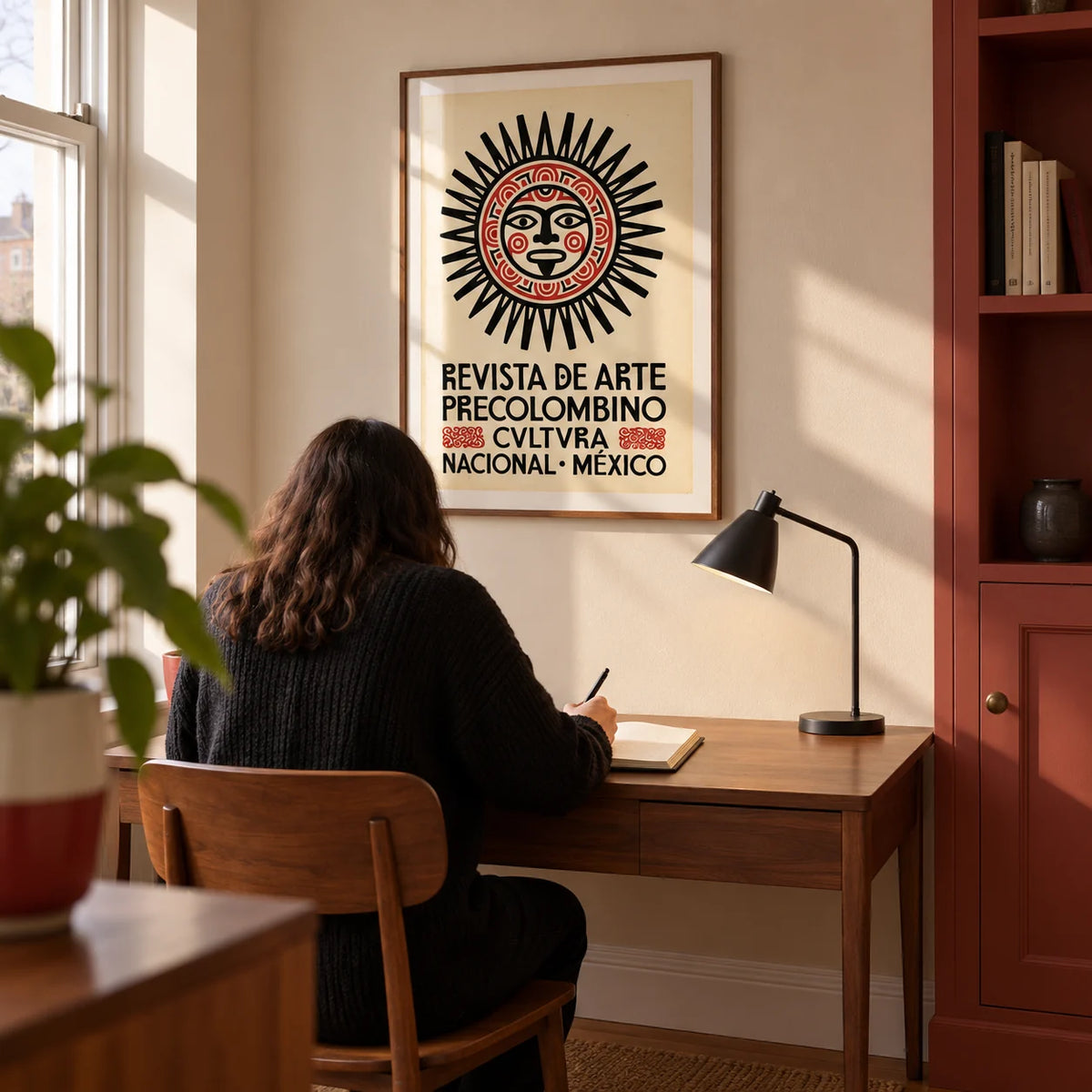 Mexican Art Print, framed on the wall of a compact design-conscious home study in a UK flat with a cream wall and a muted red built-in cupboard