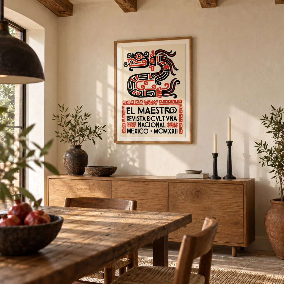 Mexican Cultural Art Print, framed on the wall of a Mexican-modern dining room with wooden ceiling beams and a cream limewashed wall