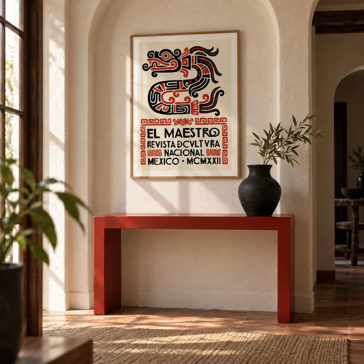 Mexican Cultural Art Print, framed on the wall of a Mexican-modern hallway with an arched plaster niche