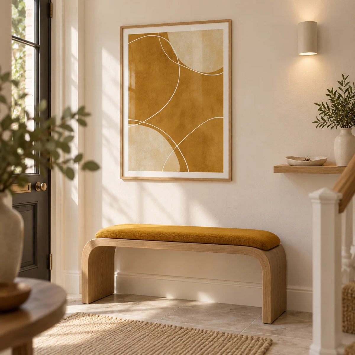 Minimalist Geometric Art Print, framed on the wall of a bright entrance hallway in a renovated UK terrace with warm white plaster walls and pale stone floor tiles