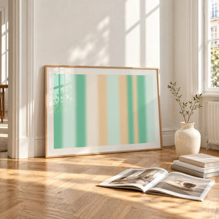 Mint Green Wall Art, framed and leaning on the parquet floor of a bright living room