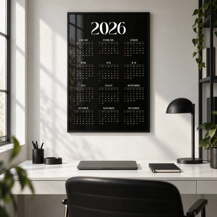 Modern Calendar Print, framed on the wall of a monochrome home office