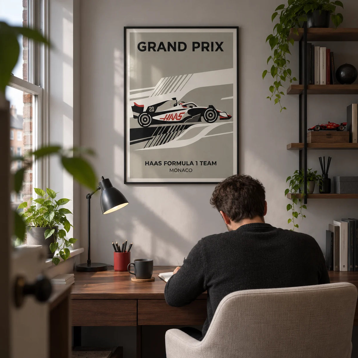 Modern Racing Car Poster, framed on the wall of a compact home study in a UK terrace for a motorsport enthusiast (25-40) with a pale grey wall