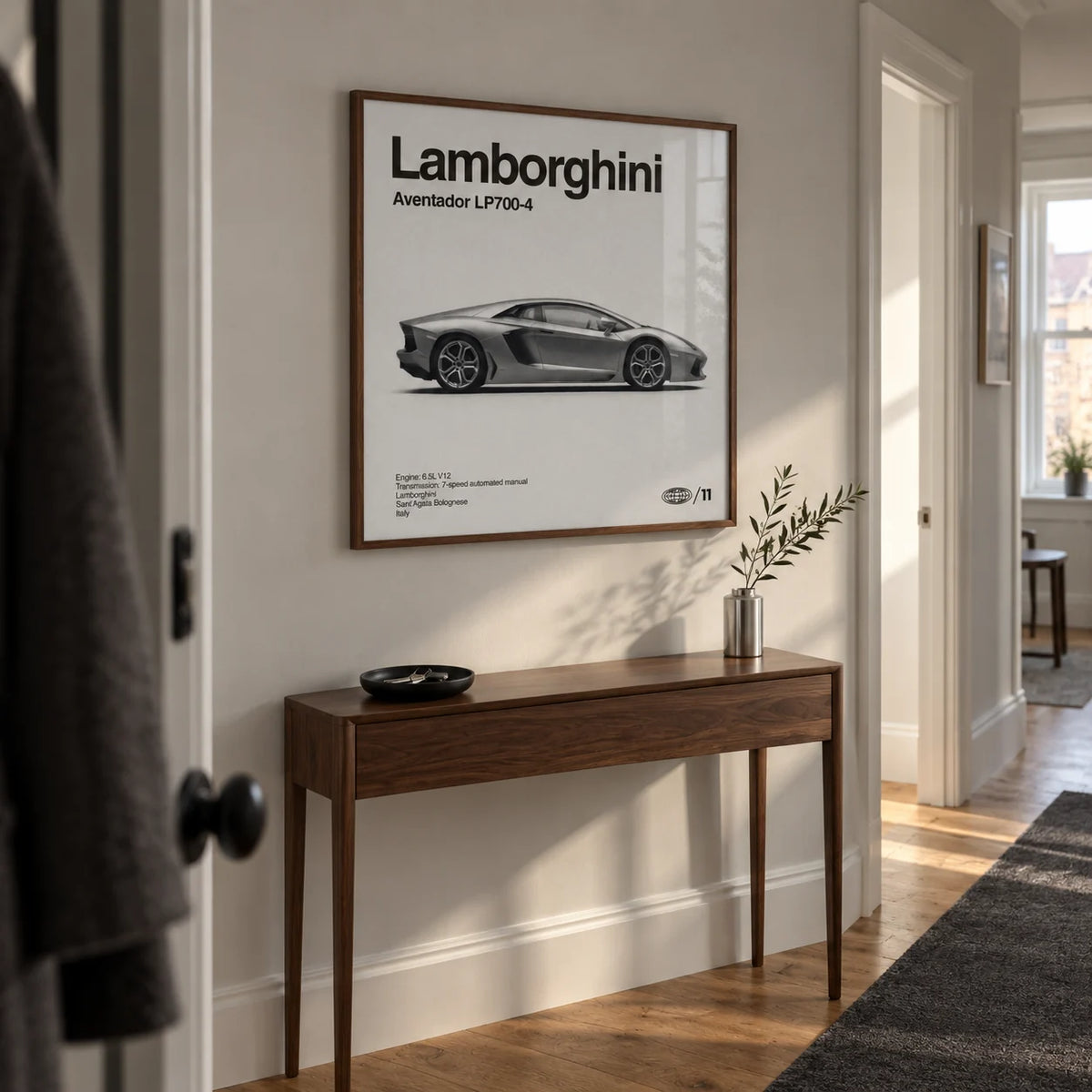 Modern Supercar Wall Art, framed on the wall of a narrow modern hallway in a UK city flat