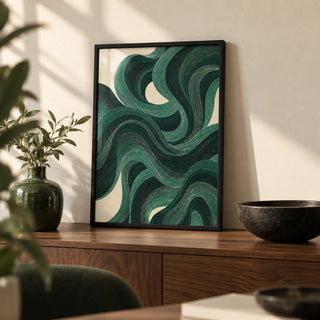 Modern Swirl Poster, a small A4 framed print leaning on a walnut sideboard in a living room