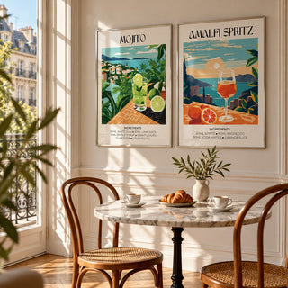 Mojito and Spritz Prints Set of 2 styled above a marble bistro table in a sunny Parisian kitchen: Mojito and Amalfi Spritz shown framed side by side (frames not included)