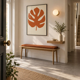 Monstera Print, framed on the wall of a design-led entrance hallway in a UK maisonette with warm white walls and large plain grey floor tiles