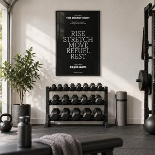 Motivational Posters with Quotes, framed on the wall of a home gym in a converted garage with white walls and black rubber flooring