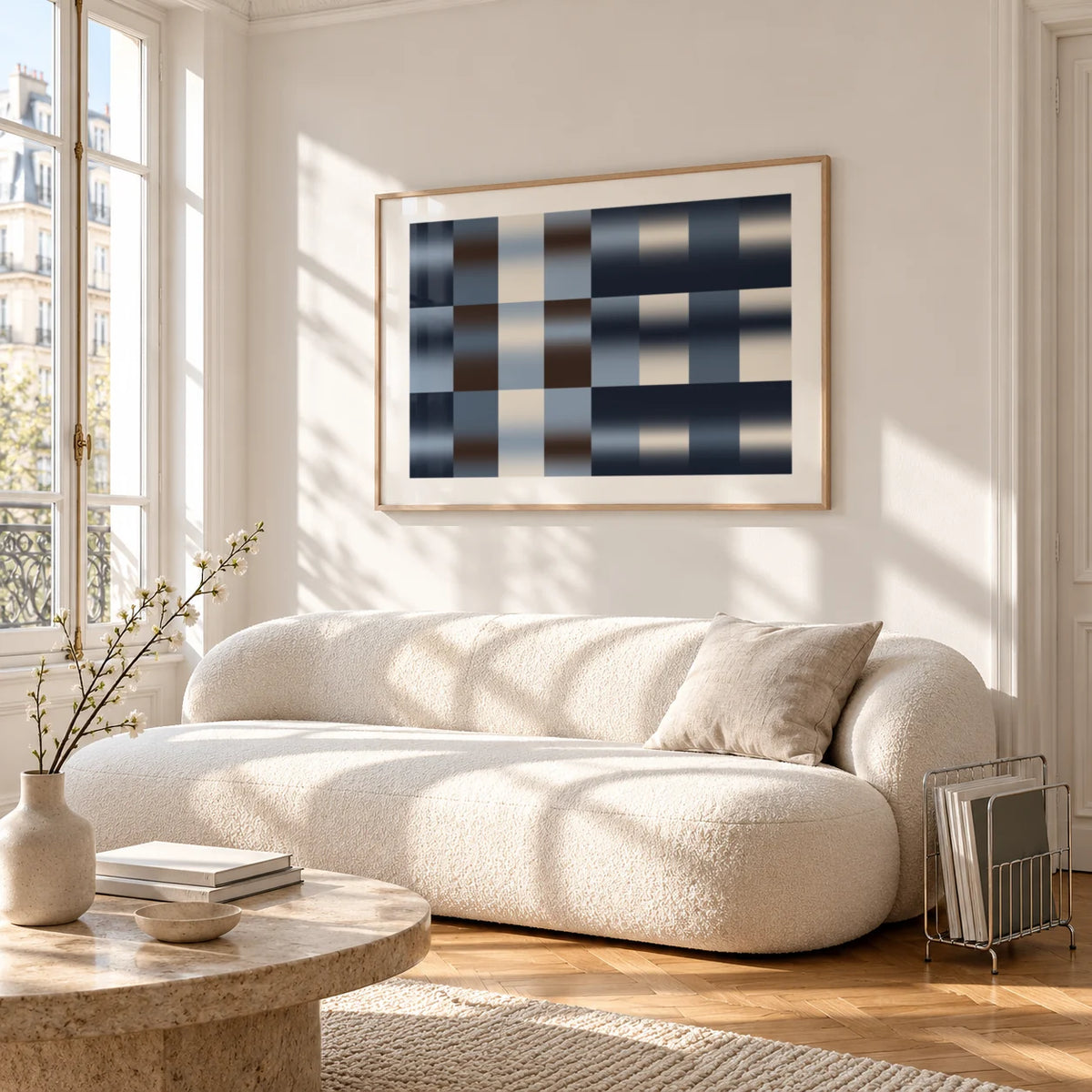 Navy Abstract Wall Art, framed on the wall of a bright living room corner