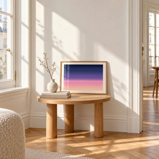 Navy and Pink Wall Art, a small A4 framed print leaning on a small solid oak side table