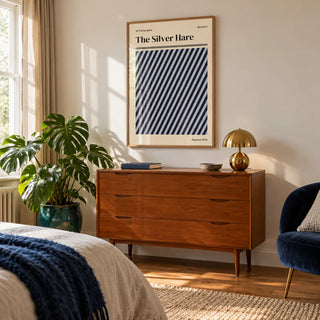 Norwich Print, framed on the wall of a bright bedroom corner with a pale wall