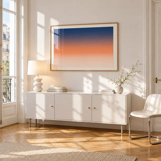 Ocean Sunset Poster, framed on the wall of a bright Paris style apartment in a living room