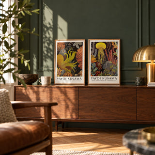 Octopus and Jellyfish Wall Art Set of 2 styled as small A4 prints on a shelf, to show the gift size: Golden Tentacle and Luminous Drift shown framed side by side (frames not included)
