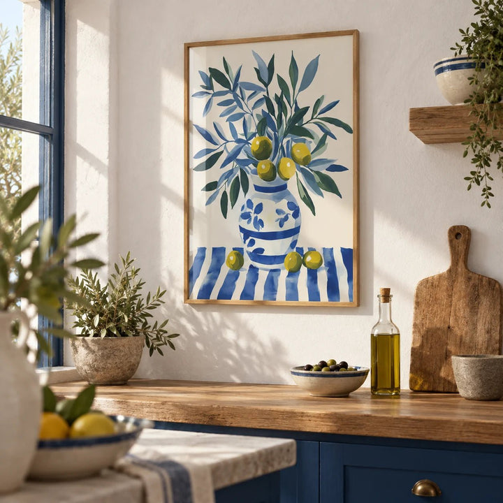 Olive Tree Wall Art, framed on the wall of a Mediterranean kitchen with white plaster walls
