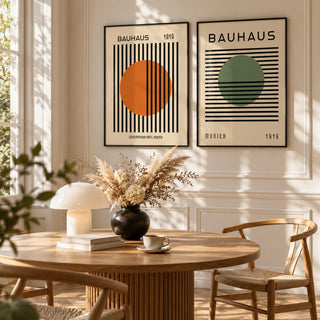 Orange and Green Wall Art Set of 2 styled above a round fluted oak dining table with a mushroom lamp: Striped Sun and Modern Orb shown framed side by side (frames not included)