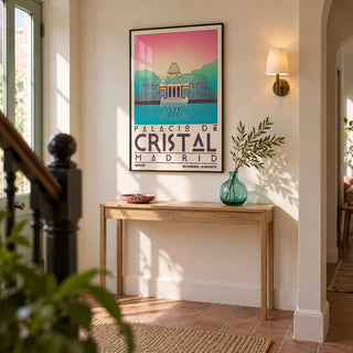 Palacio De Cristal Print, framed on the wall of a welcoming hallway in a renovated UK terrace with cream plaster walls and a simple terracotta floor