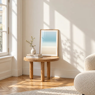 Pale Blue Wall Art, a small A4 framed print leaning on a small solid oak side table