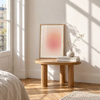 Peach Print, a small A4 framed print leaning on a small solid oak side table