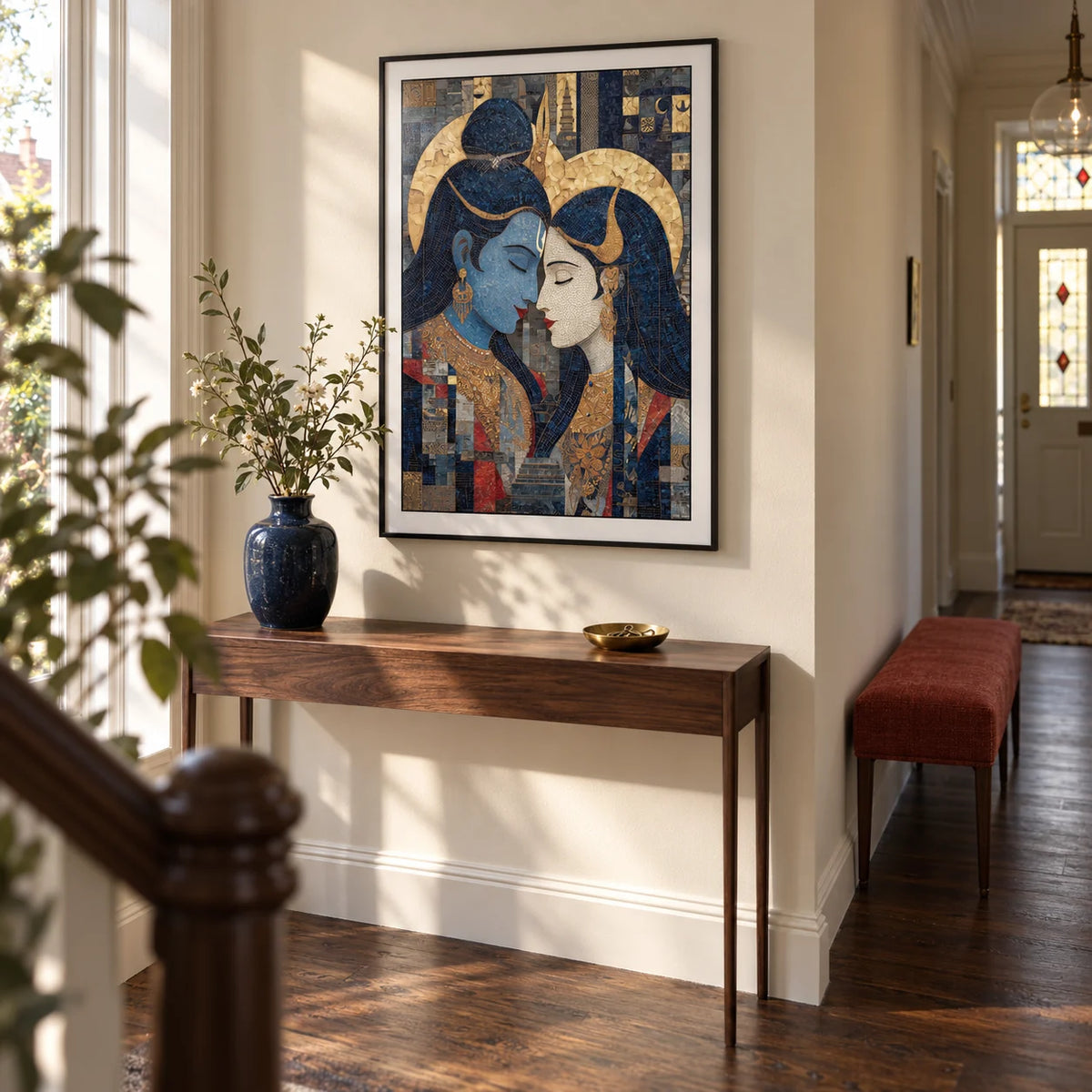Pic Of Shiva And Parvati Wall Art, framed on the wall of a welcoming hallway in a renovated British semi-detached home with warm ivory walls and a dark timber floor