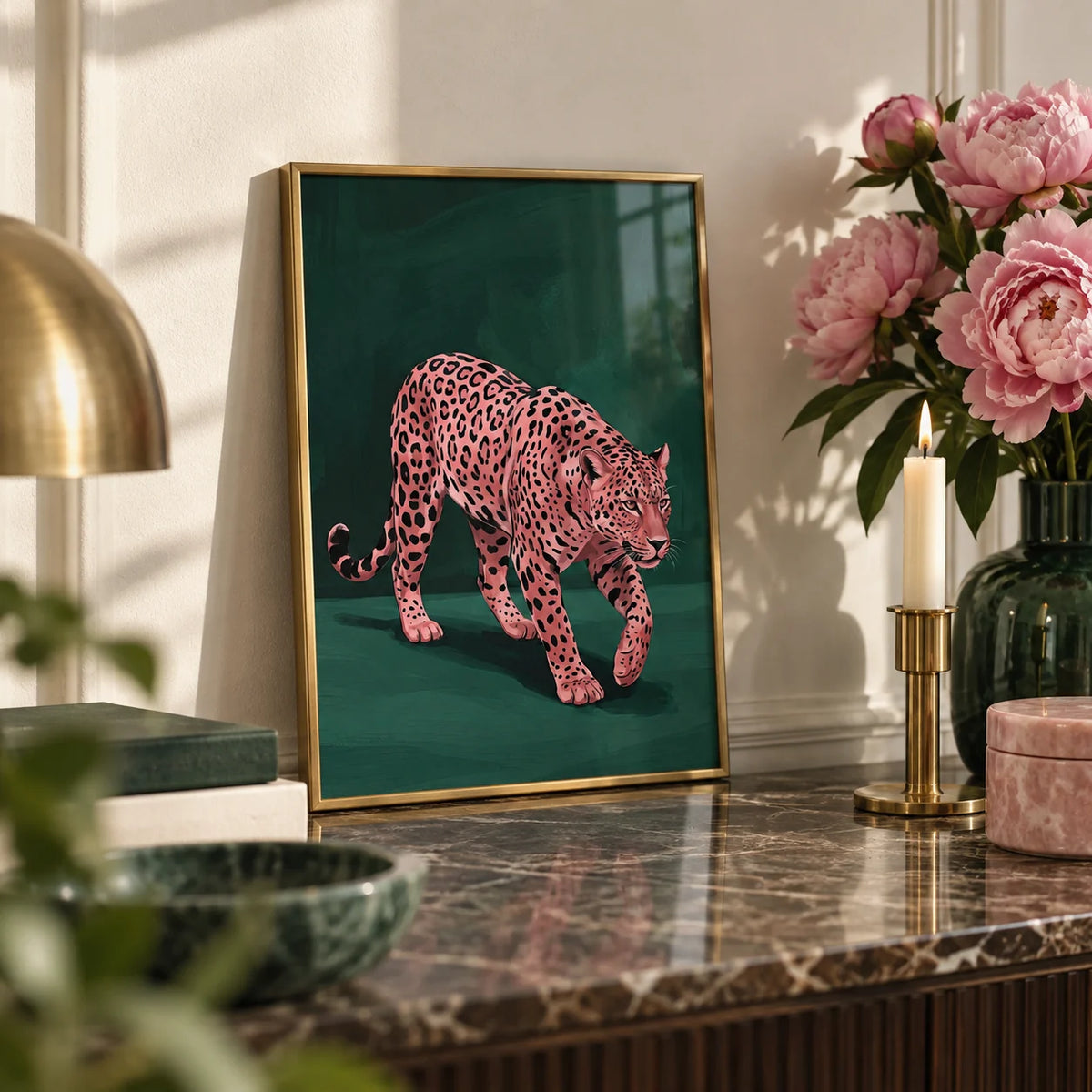 Pink Leopard Wall Art, a small A4 framed print leaning on a marble side table in a hallway