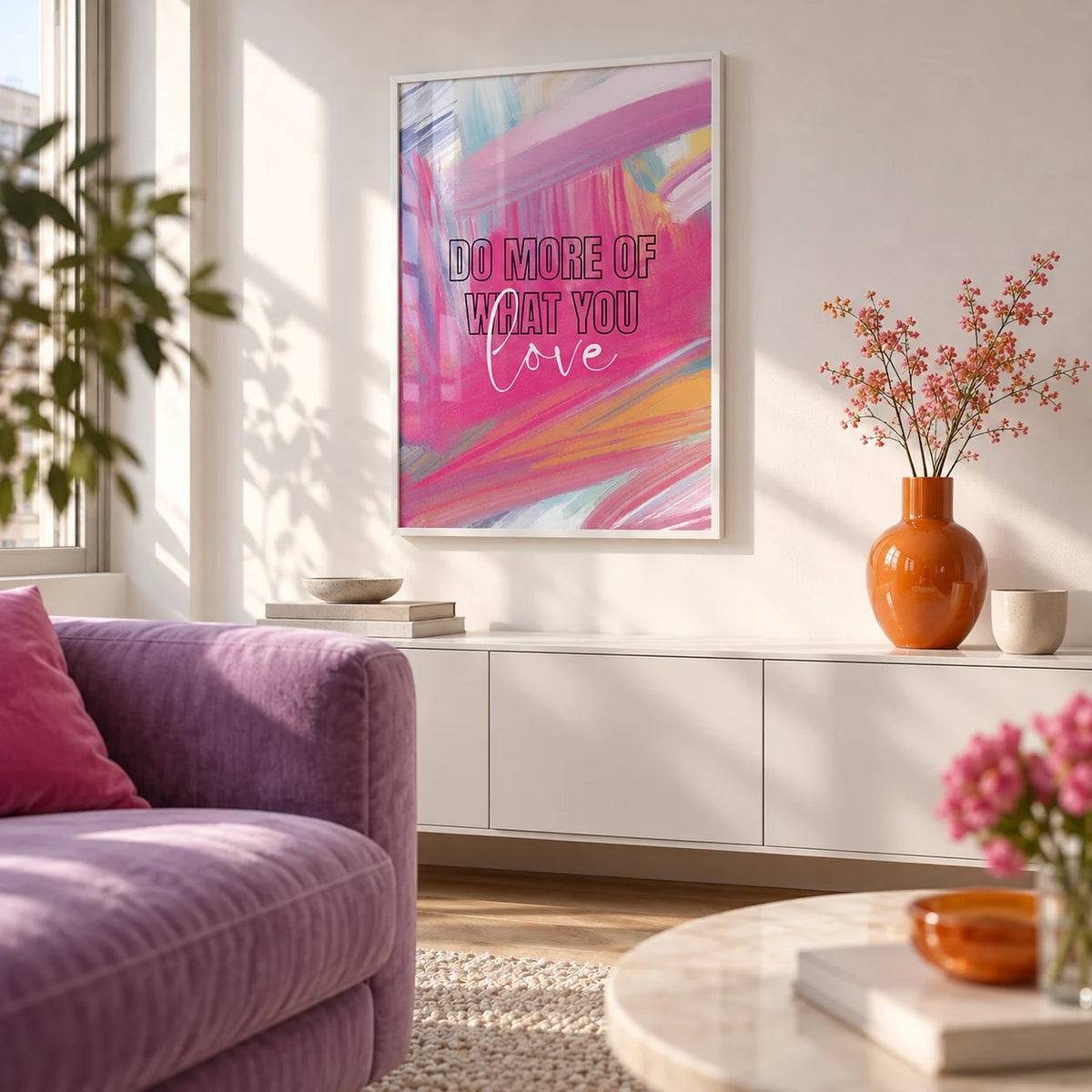 Pink Motivational Posters, framed on the wall of a first-flat living room (22-28) with a white wall