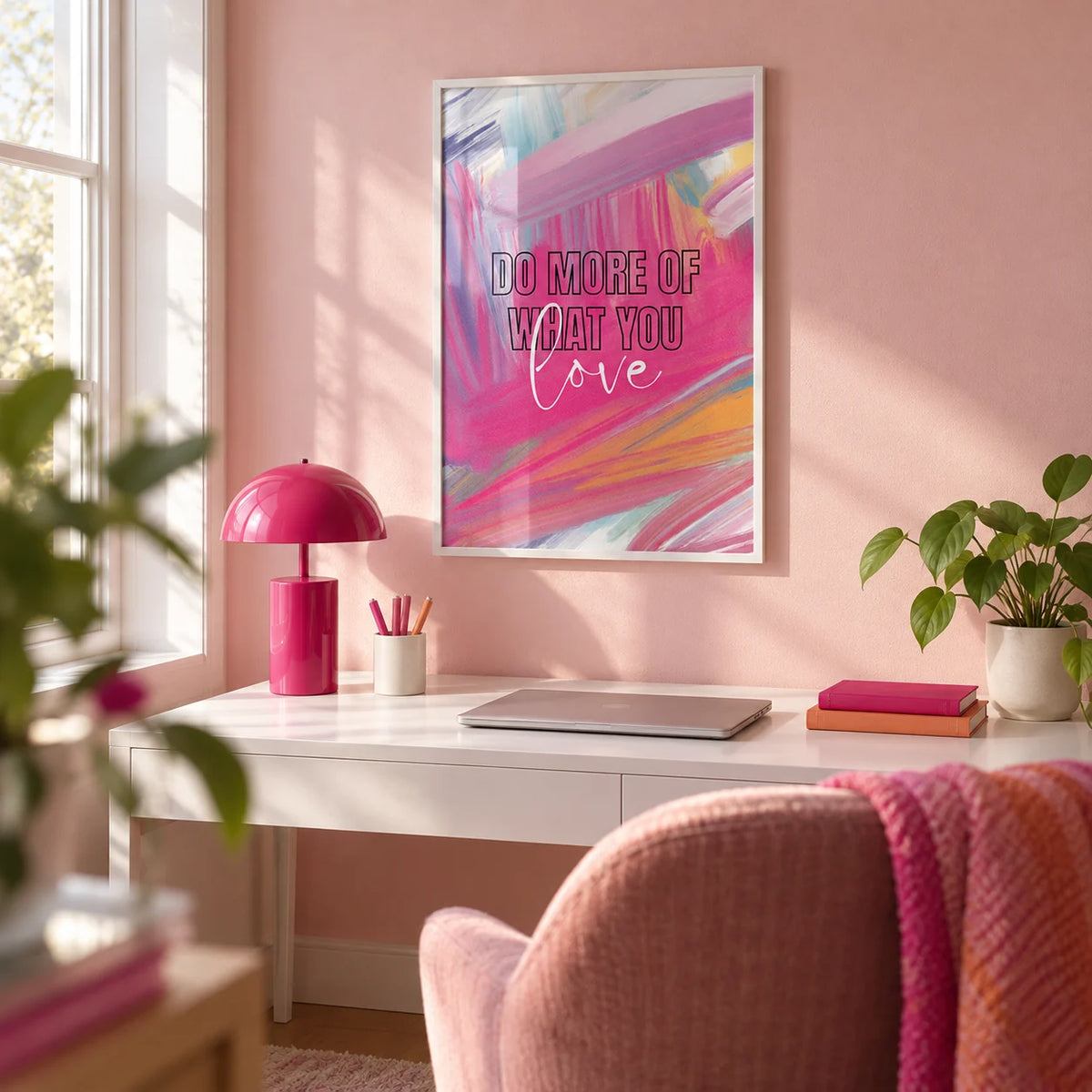Pink Motivational Posters, framed on the wall of a home office with a soft pink painted wall