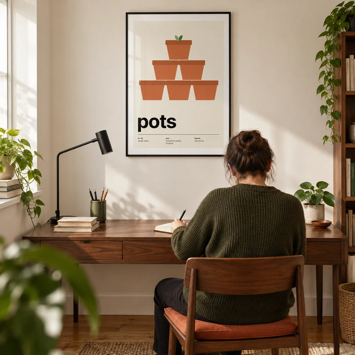 Plant Pot Print, framed on the wall of a modern home study in a UK terraced house with a warm off-white wall and oak floor