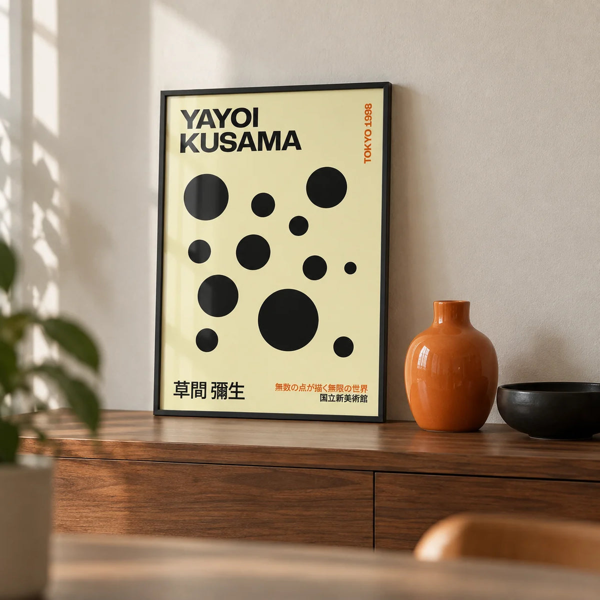Polka Dot Artwork, a small A4 framed print leaning on a walnut shelf in a living room