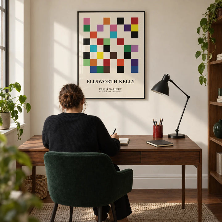 Posters for Office, framed on the wall of a crisp home office in a design-led UK flat with a warm white wall and walnut floor