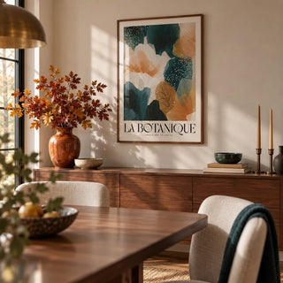 Posters of Autumn, framed on the wall of a warm dining room