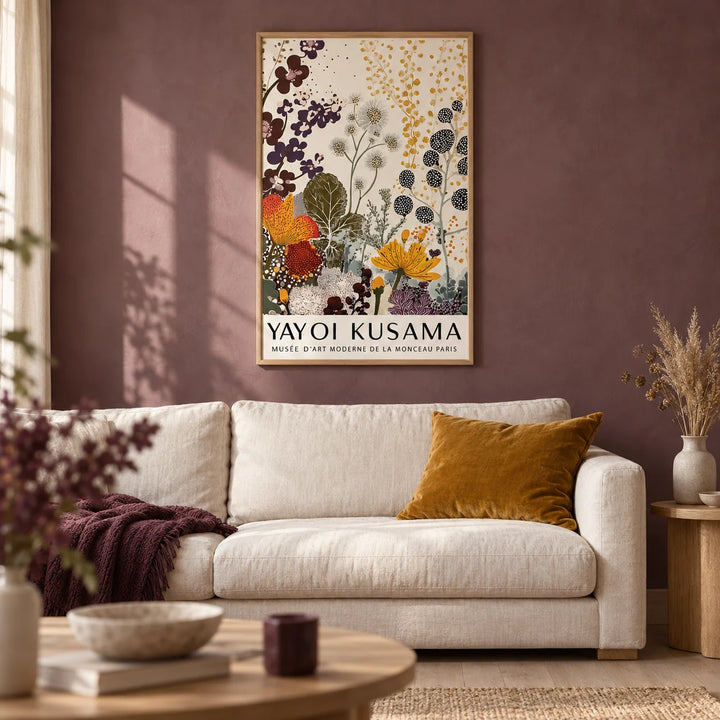 Print Yayoi Kusama, framed on the wall of a calm living room with a soft plum limewashed wall and a pale oak floor