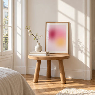 Raspberry Print, a small A4 framed print leaning on a small solid oak side table