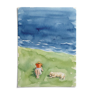 Reading By The Sea Art Print, shown as an unframed paper print on a plain white background