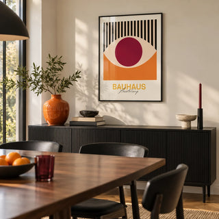 Retro Eye Wall Art, framed on the wall of a modern dining room with a cream wall