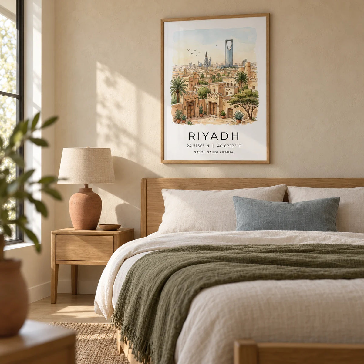 Riyadh Cityscape Wall Art, framed on the wall of a calm main bedroom in a UK home with a sandy plaster wall and pale oak floor