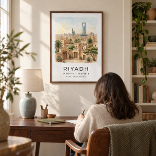Riyadh Cityscape Wall Art, framed on the wall of a quiet home study in a UK house with a soft ivory wall and a tall recessed bookshelf