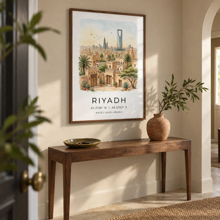 Riyadh Cityscape Wall Art, framed on the wall of a welcoming hallway in a renovated UK townhouse with a pale sand wall and simple limestone floor