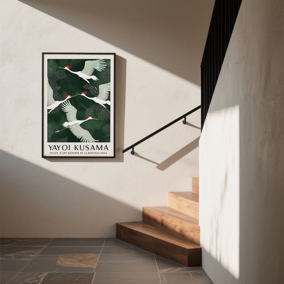Japandi wall art of red-crowned cranes in flight with dark green background hanging near staircase