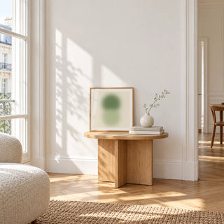 Sage and Olive Print, a small square framed print leaning on a small solid oak side table