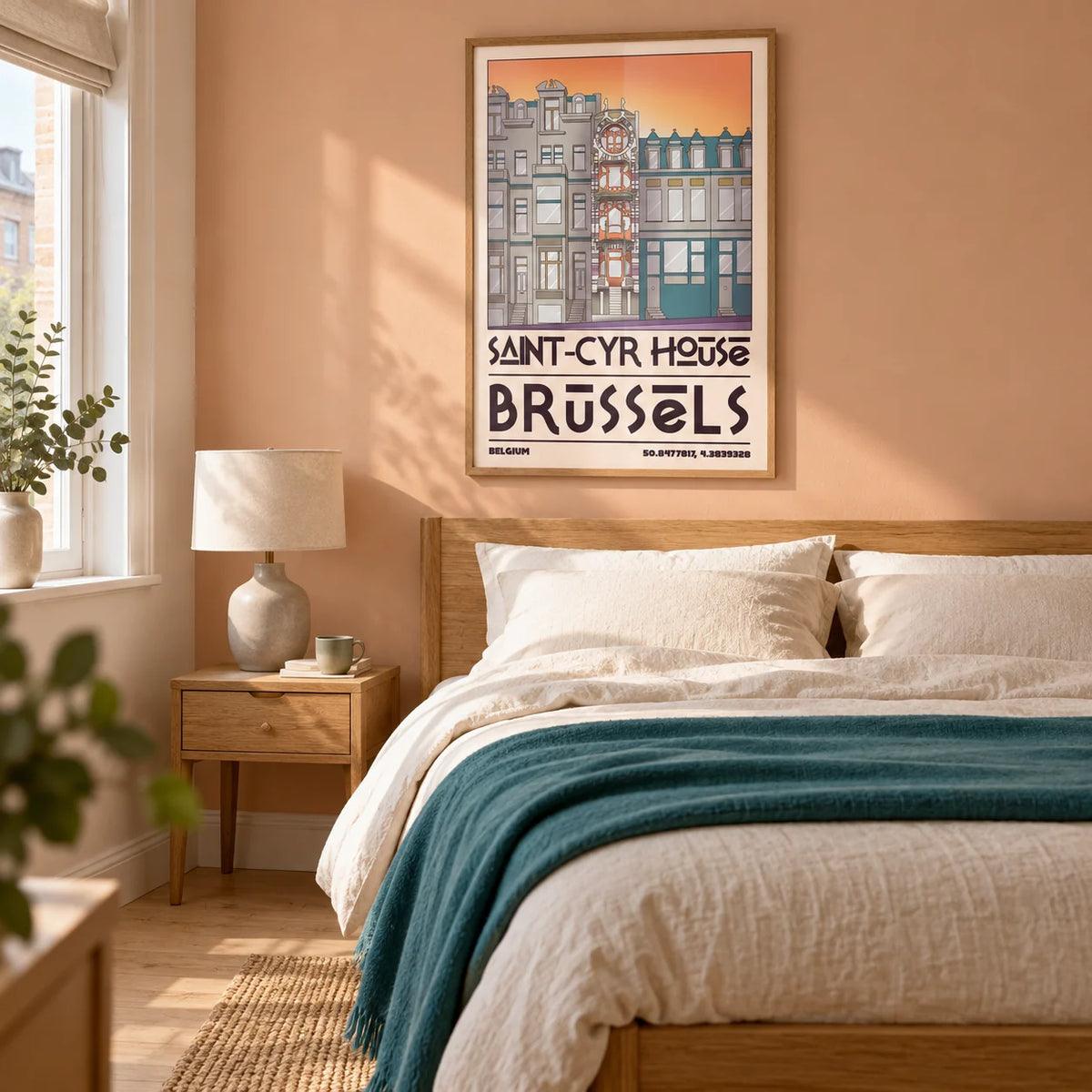 Saint Cyr House Poster, framed on the wall of a warm contemporary bedroom in a UK city flat with a muted peach wall and pale oak floorboards
