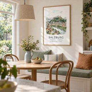 Salzburg City Print, framed on the wall of a light dining alcove in a UK garden flat with warm white walls and a built-in bench
