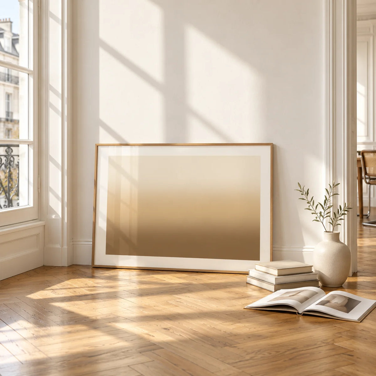 Sand Wall Art, framed and leaning on the parquet floor of a bright living room